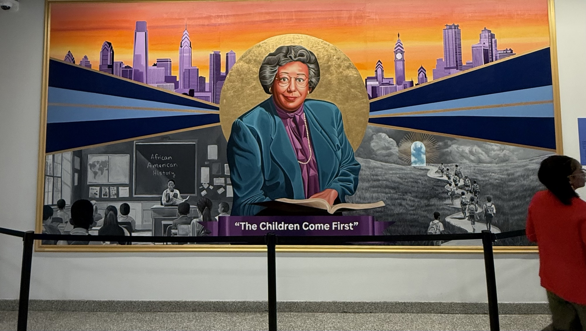 a mural of a woman in bright colors